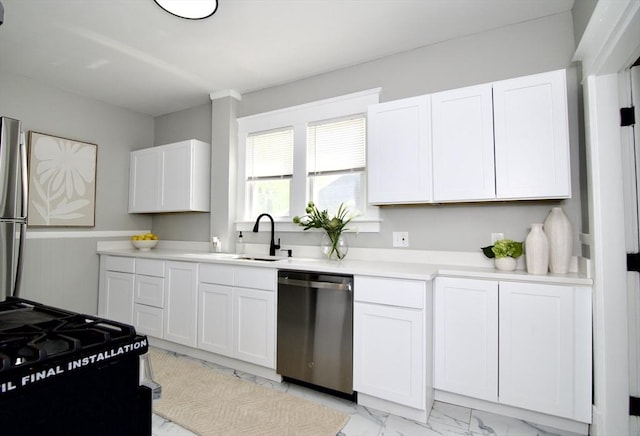 kitchen with white cabinets, a sink, dishwasher, black range with gas cooktop, and marble finish floor