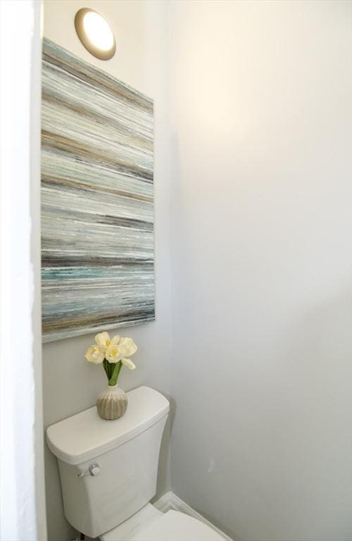 bathroom featuring toilet