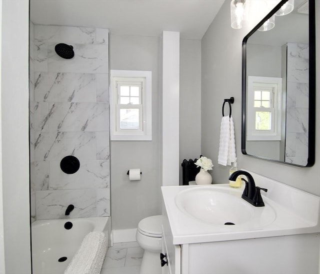 full bathroom featuring vanity, shower / bathing tub combination, toilet, marble finish floor, and baseboards