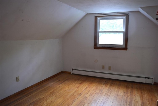 181 Adrian Ave, West Springfield, MA 01089 - bonus room with a baseboard radiator, wood-type flooring, lofted ceiling, and baseboards