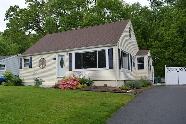 181 Adrian Ave, West Springfield, MA 01089 - new england style home featuring a shingled roof