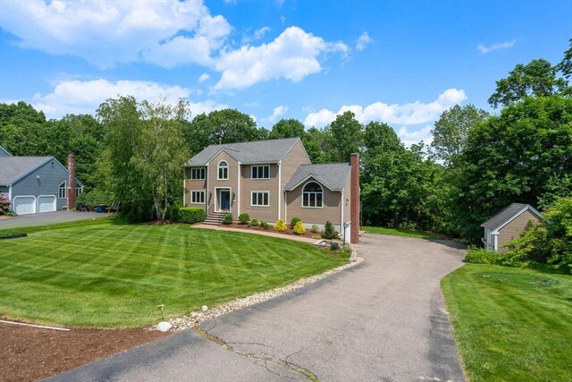 66 Ashcroft Rd, Sharon, MA 02067 - colonial house with a front lawn and a chimney