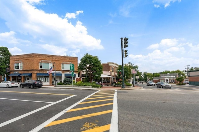 66 Ashcroft Rd, Sharon, MA 02067 - view of asphalt street with traffic lights, sidewalks, curbs, and street lights