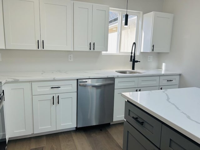 kitchen with white cabinetry, dishwasher, light stone countertops, sink, and dark hardwood / wood-style flooring