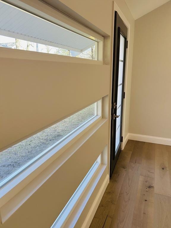 interior space with hardwood / wood-style flooring