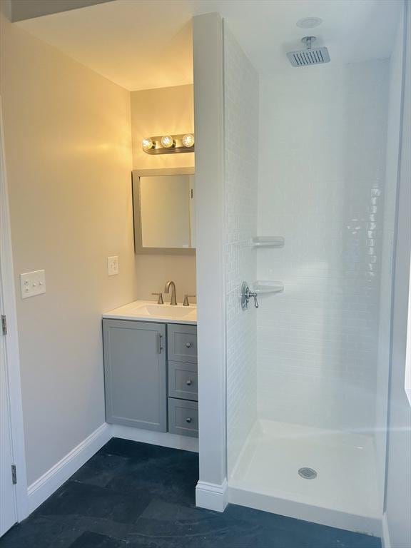 bathroom featuring vanity and walk in shower