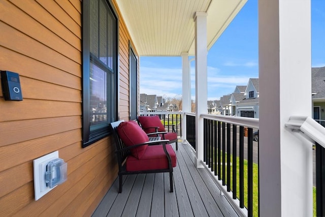 balcony featuring a residential view