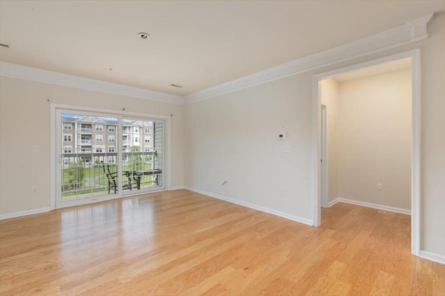 1 Francis Dr Unit 211, Andover, MA 01810 - unfurnished room with light wood-style flooring, baseboards, and ornamental molding