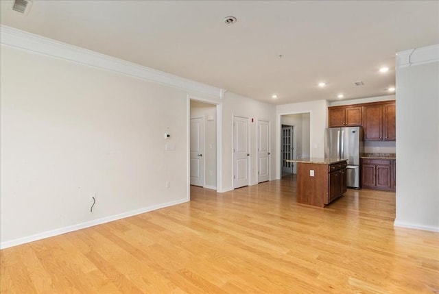 1 Francis Dr Unit 211, Andover, MA 01810 - kitchen with freestanding refrigerator, a kitchen island, recessed lighting, light wood finished floors, and crown molding