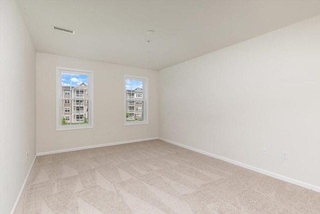 1 Francis Dr Unit 211, Andover, MA 01810 - empty room with light colored carpet and baseboards
