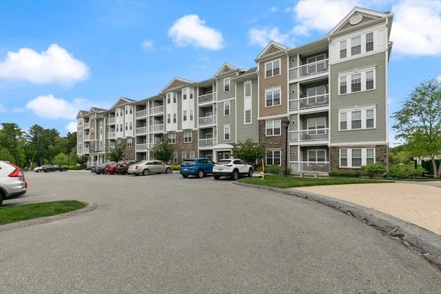 1 Francis Dr Unit 211, Andover, MA 01810 - view of apartment building / complex with uncovered parking