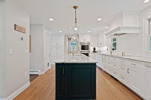3 Squantum Rd, Paxton, MA 01612 - kitchen featuring a sink, white cabinets, decorative backsplash, double oven, and light wood-type flooring