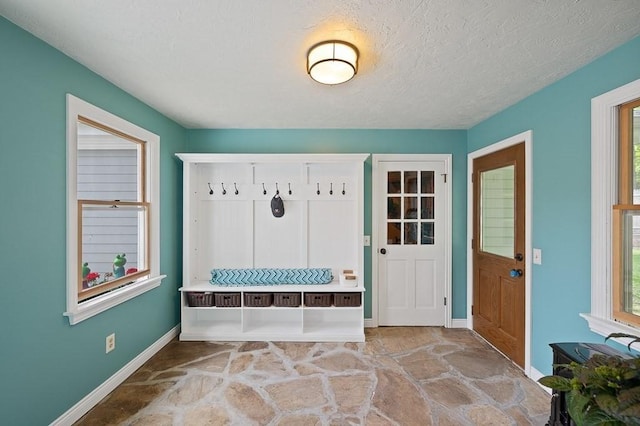 3 Squantum Rd, Paxton, MA 01612 - mudroom with stone floors and baseboards