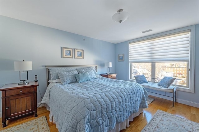 bedroom featuring light hardwood / wood-style floors