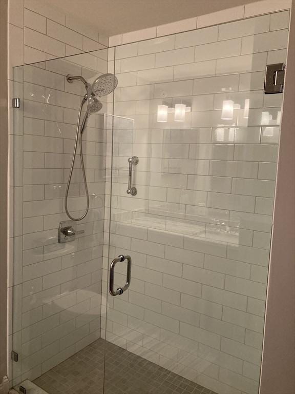 bathroom featuring an enclosed shower