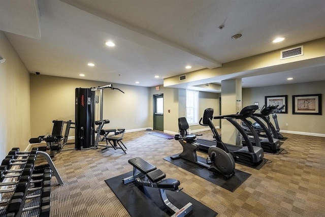 gym with light colored carpet