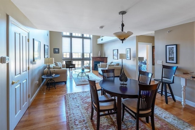 dining space featuring hardwood / wood-style floors