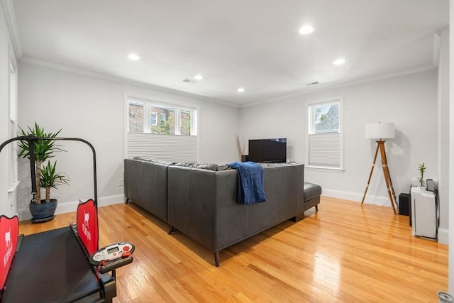 8 Brinton St Unit 2, Boston, MA 02119 - living room with light wood finished floors, ornamental molding, baseboards, and recessed lighting