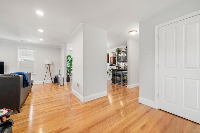 8 Brinton St Unit 2, Boston, MA 02119 - living room featuring light wood finished floors, crown molding, recessed lighting, and baseboards