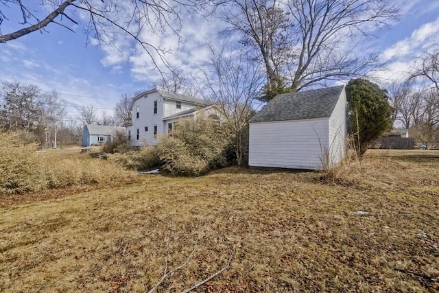 view of yard with a storage unit and an outdoor structure