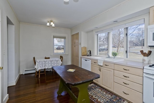 kitchen with dark wood-type flooring, a sink, a baseboard heating unit, white appliances, and baseboards