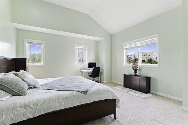 15 Queen Isabella Way Unit 15, Ashland, MA 01721 - carpeted bedroom with vaulted ceiling, multiple windows, baseboards, and an office area
