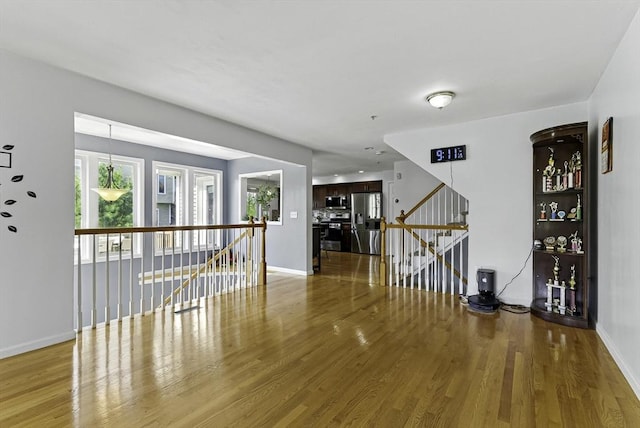 15 Queen Isabella Way Unit 15, Ashland, MA 01721 - unfurnished room with wood finished floors and baseboards