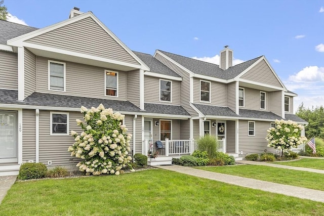 127 Bayberry Hill Ln Unit 127, Leominster, MA 01453 - townhome / multi-family property with a chimney, a porch, a front yard, and a shingled roof
