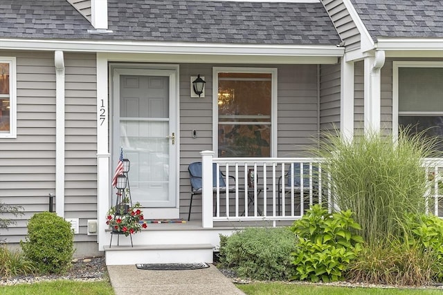 127 Bayberry Hill Ln Unit 127, Leominster, MA 01453 - view of exterior entry with covered porch and a shingled roof