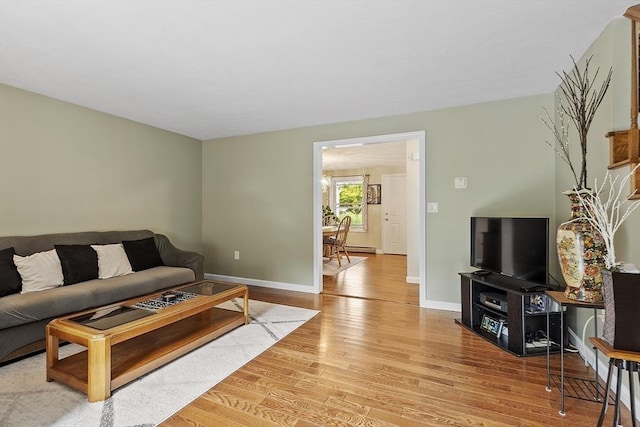 127 Bayberry Hill Ln Unit 127, Leominster, MA 01453 - living room with light wood finished floors and baseboards