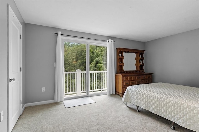 127 Bayberry Hill Ln Unit 127, Leominster, MA 01453 - carpeted bedroom with access to exterior and baseboards