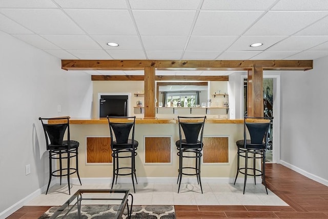 127 Bayberry Hill Ln Unit 127, Leominster, MA 01453 - kitchen featuring a paneled ceiling, recessed lighting, baseboards, black refrigerator, and wood finished floors
