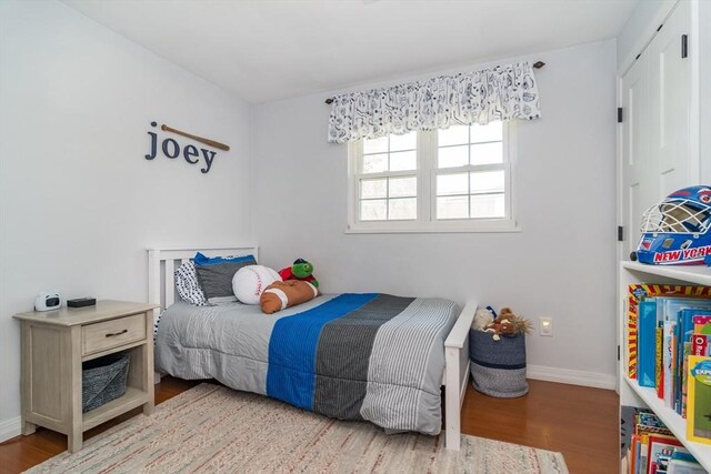 120 Hartford St, Natick, MA 01760 - bedroom with wood finished floors and baseboards
