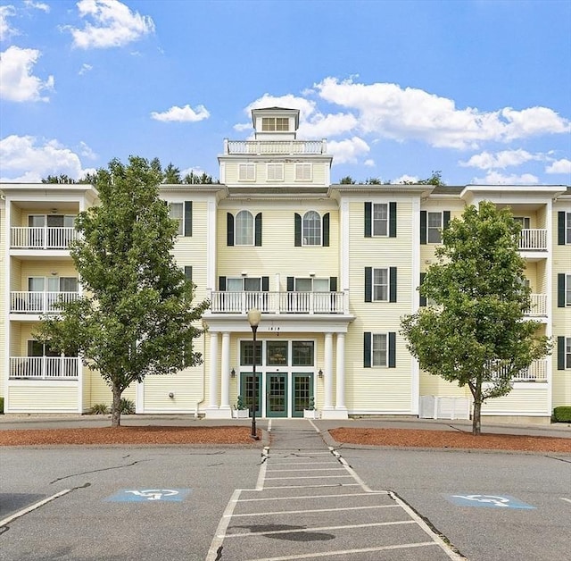 1818 Main St Unit 307, Holden, MA 01522 - view of building exterior featuring uncovered parking