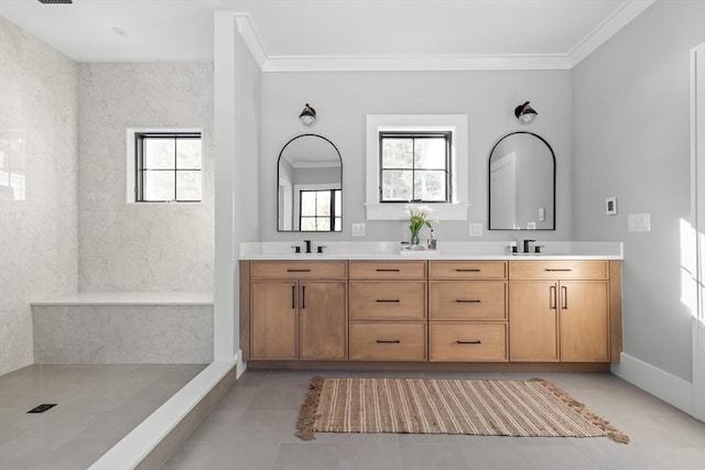 bathroom with ornamental molding, tile patterned flooring, and vanity