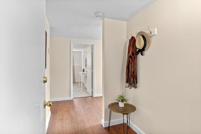 corridor featuring light hardwood / wood-style floors