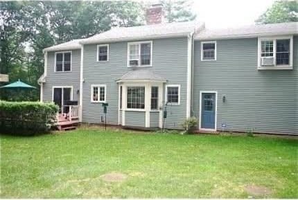 8 Caleb Rd, Shirley, MA 01464 - back of house featuring a yard, a chimney, and a deck