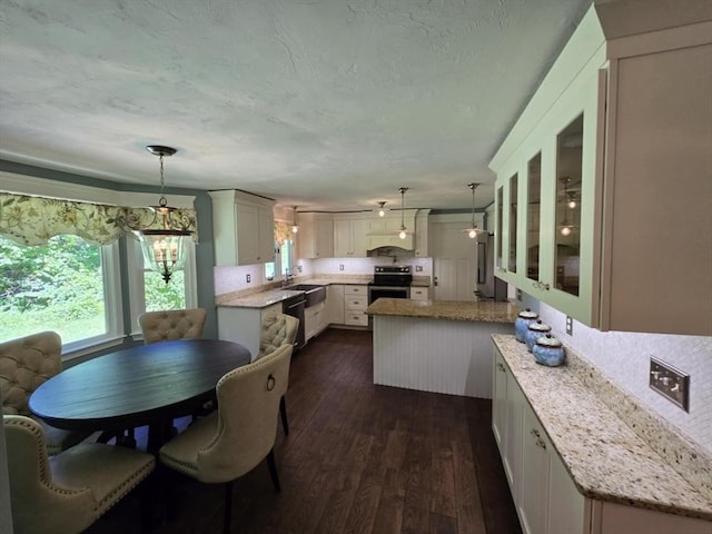 8 Caleb Rd, Shirley, MA 01464 - kitchen featuring electric range, dark wood-style floors, dishwasher, a peninsula, and pendant lighting