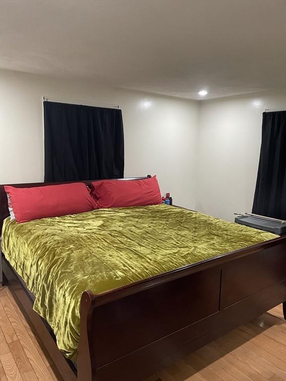 bedroom with light hardwood / wood-style flooring