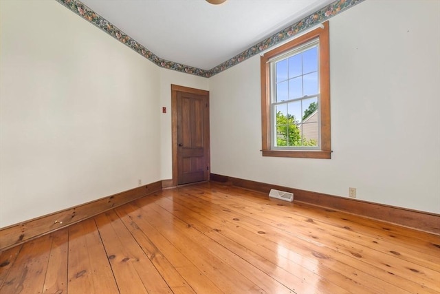 7 Martin St, Danvers, MA 01923 - empty room featuring baseboards and hardwood / wood-style flooring