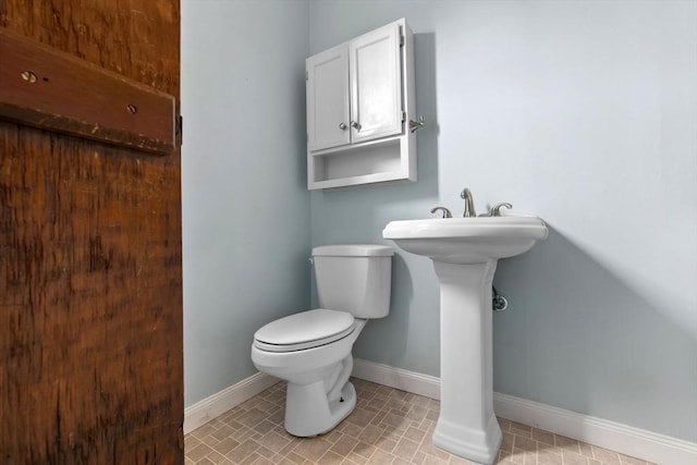 7 Martin St, Danvers, MA 01923 - half bath with toilet and baseboards
