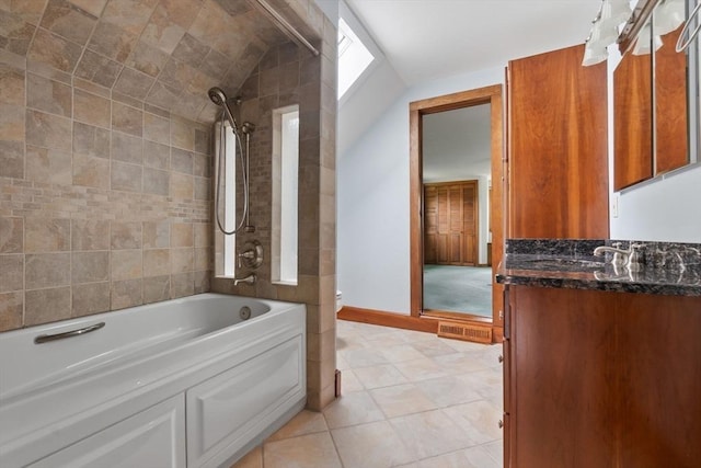 7 Martin St, Danvers, MA 01923 - full bathroom with vanity, tub / shower combination, vaulted ceiling, and tile patterned floors