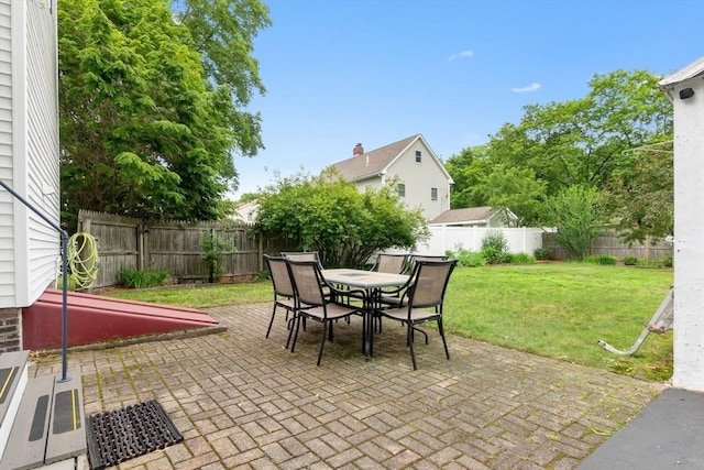 7 Martin St, Danvers, MA 01923 - fenced backyard with a patio and outdoor dining space