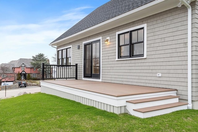 deck featuring a lawn