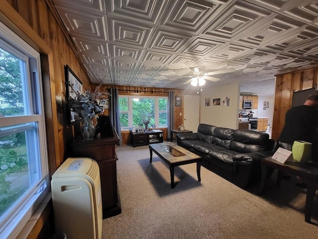 39 Cheever Rd, Malden, MA 02148 - living area with an ornate ceiling, a ceiling fan, carpet flooring, and wood walls