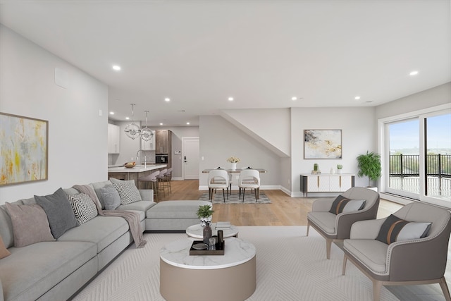 living room with light hardwood / wood-style flooring