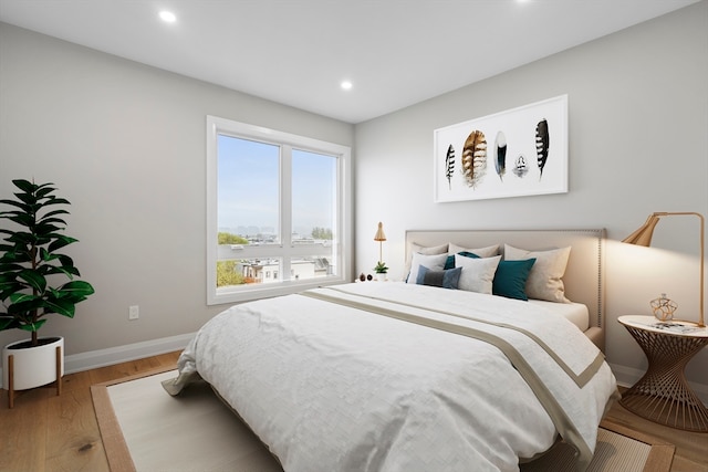 bedroom featuring wood-type flooring