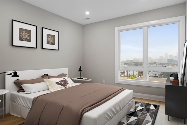 bedroom featuring light hardwood / wood-style floors