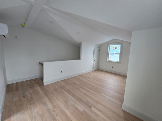 9 Swan St Unit 1, Beverly, MA 01915 - bonus room featuring a wall mounted AC and light wood finished floors