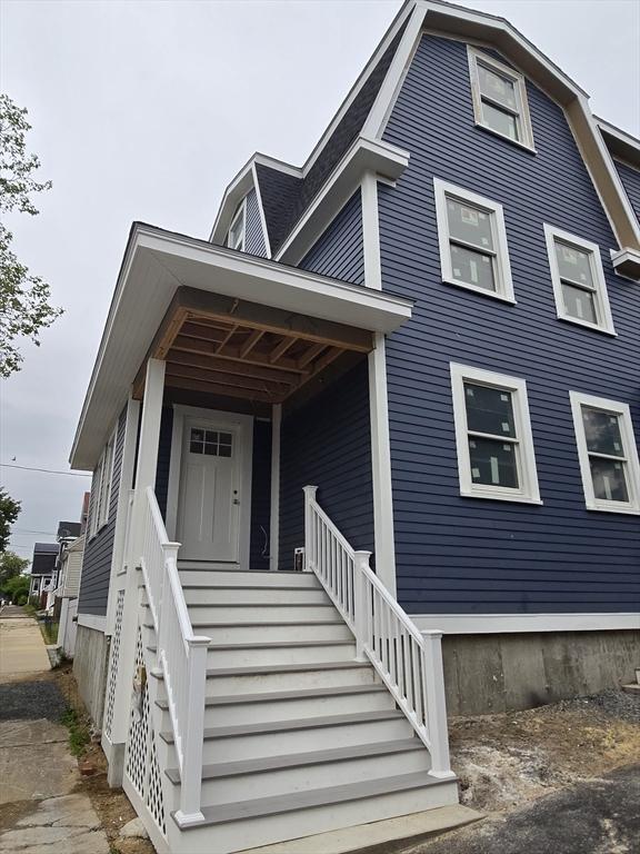 9 Swan St Unit 1, Beverly, MA 01915 - view of front of property featuring stairs and a porch
